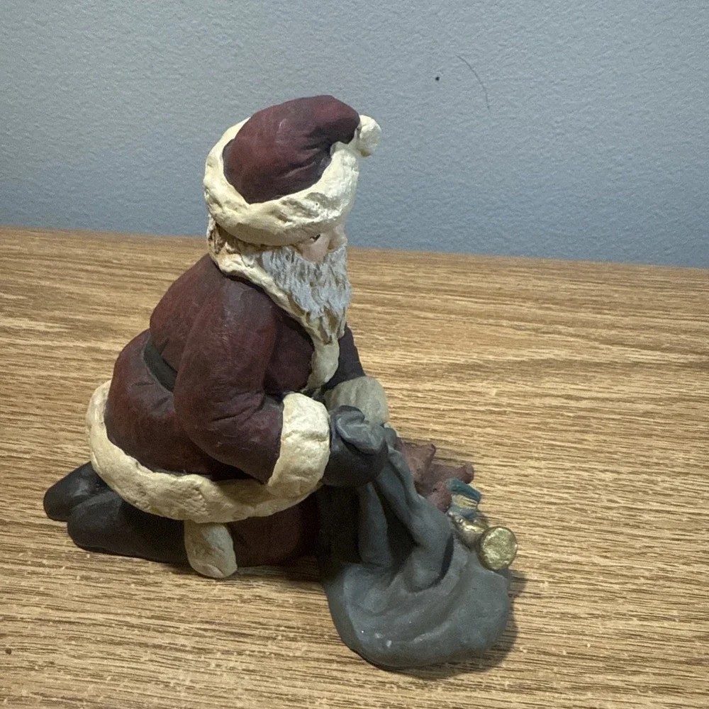Santa Figurine Pulling‎ Toys Out Of A Sack